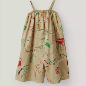 COS Cotton Jumpsuit/dress
Playful in colour and print. 

.